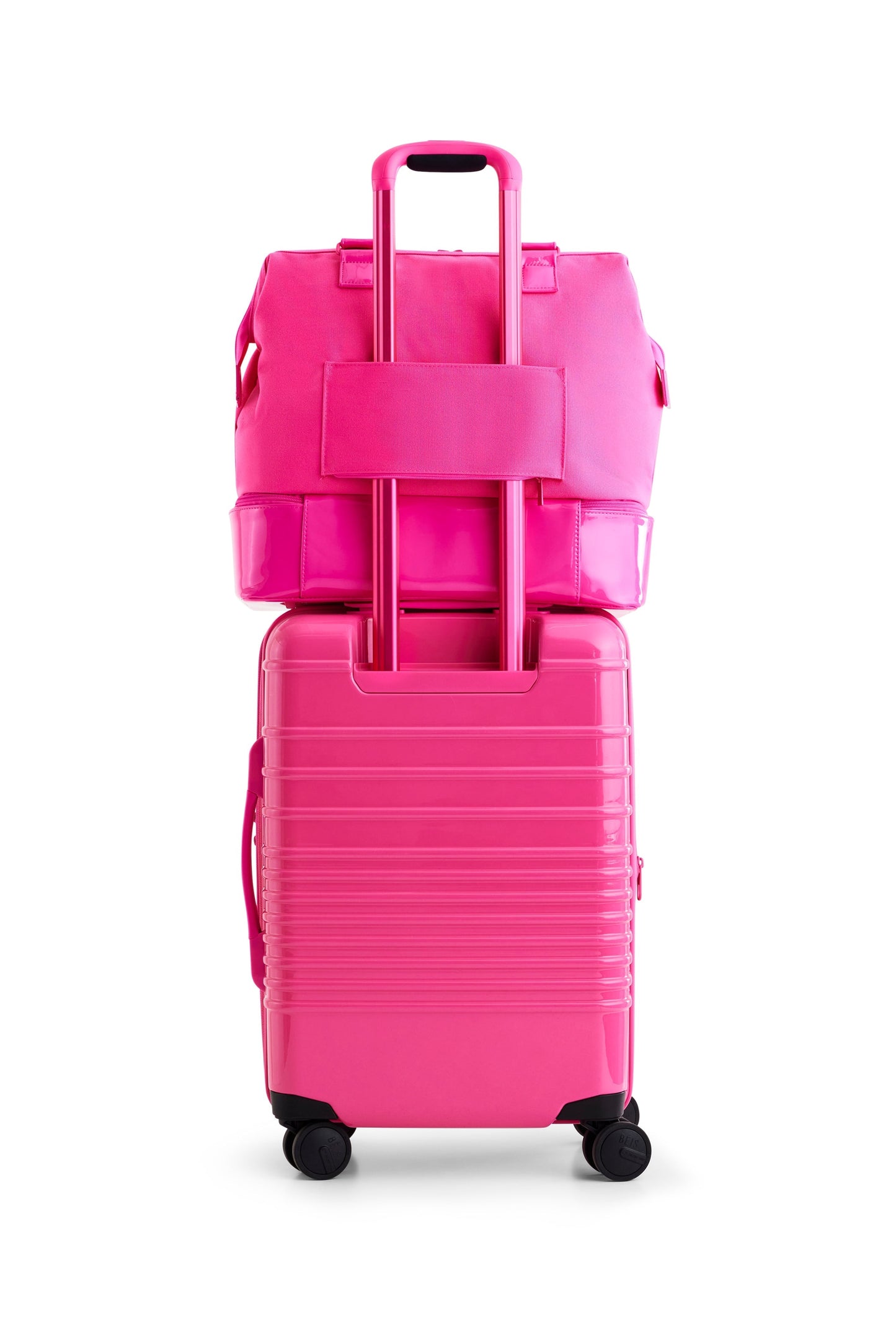 The Carry-On Roller in Barbieƒ?› Pink