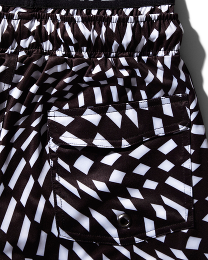 KIDS TRIPPY SWIM TRUNKS