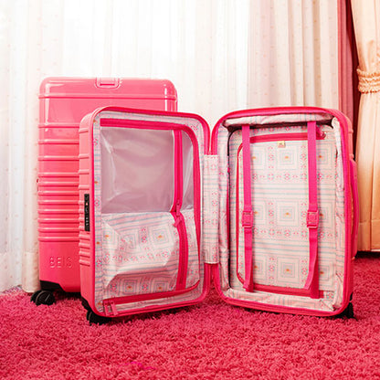 The Carry-On Roller in Barbieƒ?› Pink